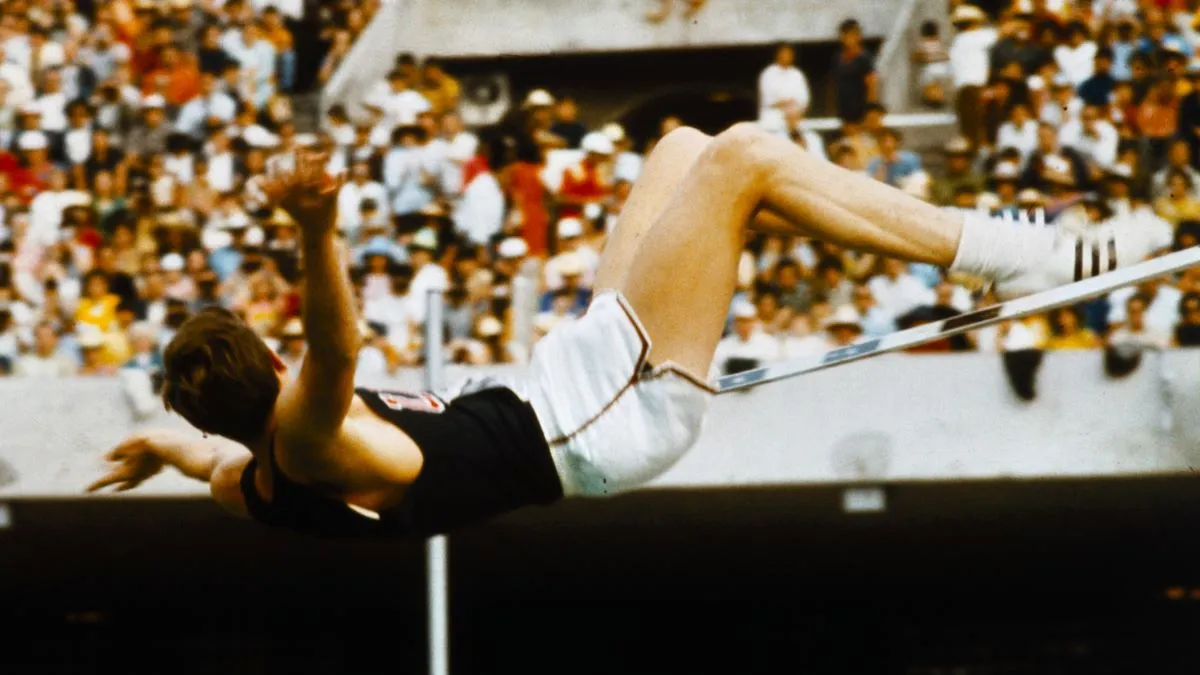 Richard Fosbury of the U.S., in his unusual "flip-flop" style, sets an Olympic record as he clears the bar in the high jump event at 7 feet, 4 1/2 inches in the 1968 Olympic.