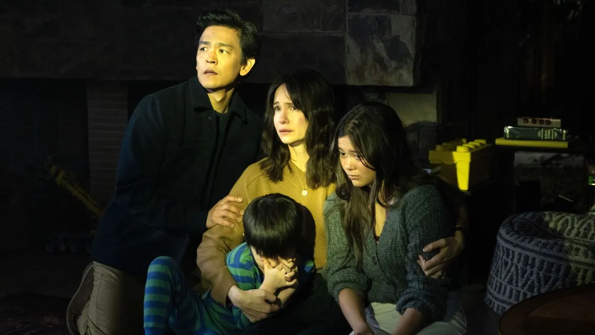 John Cho, Isaac Bae, Katherine Waterston, and Lukita Maxwell in AfrAId (2024)