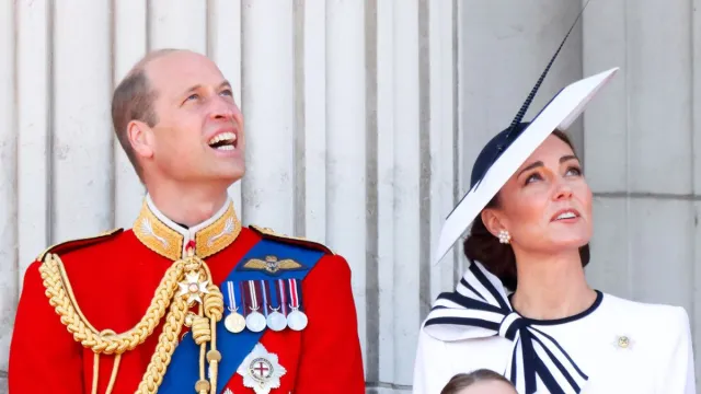 Prince William, Prince of Wales (Colonel of the Welsh Guards) and Catherine, Princess of Wales watch an RAF flypast from the balcony of Buckingham Palace after attending Trooping the Colour on June 15, 2024 in London, England. Trooping the Colour, also known as The King's Birthday Parade, is a military ceremony to mark the official birthday of the British Sovereign. The ceremony takes place at Horse Guards Parade followed by a flypast over Buckingham Palace and was first performed in the mid-17th century during the reign of King Charles II. The parade features all seven regiments of the Household Division with Number 9 Company, Irish Guards being the regiment this year having their Colour Trooped. (Photo by Max Mumby/Indigo/Getty Images)