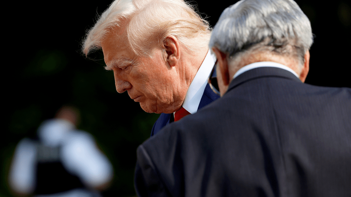 Republican presidential nominee, former U.S. President Donald Trump stands alongside Bill Barnett