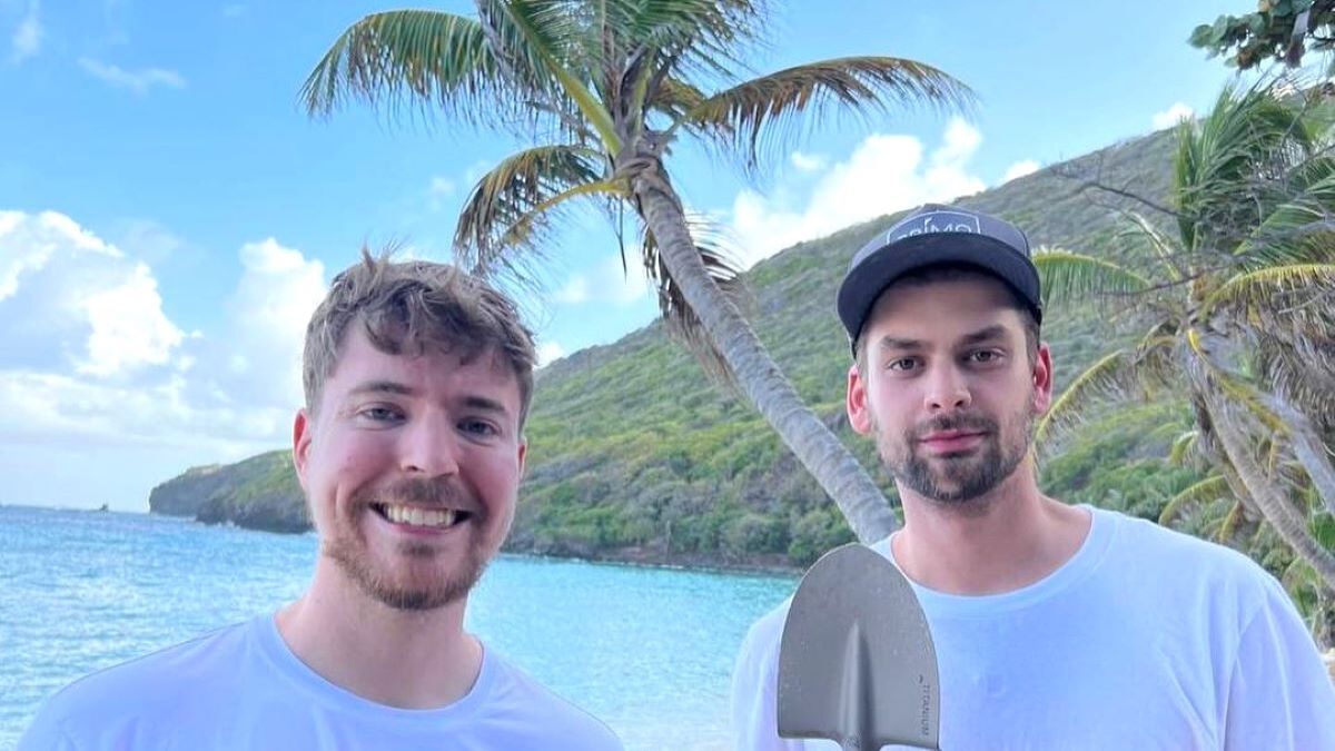 A picture of Chandler Hallow (R) and Jimmy Donaldson, aka MrBeast (L), smiling on an island