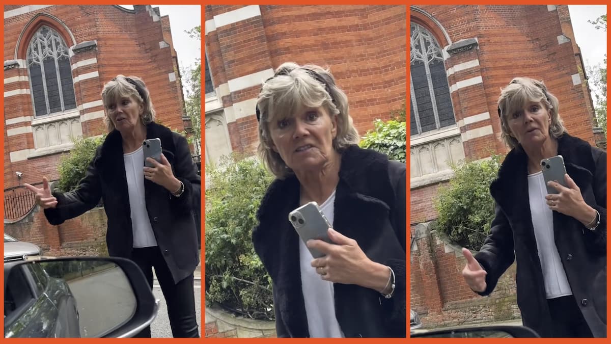 Angry woman monitors the street in front of a church with the worst threat imaginable