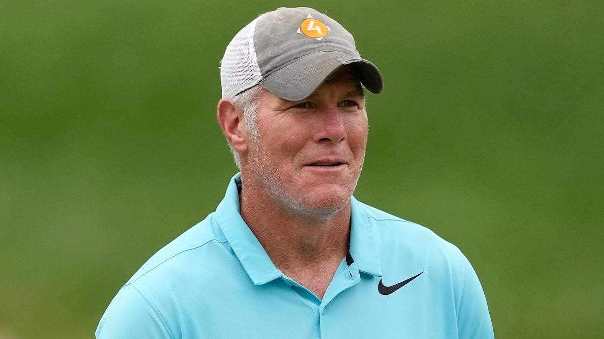 Former NFL player Brett Favre walks up the 14th fairway during the Celebrity Foursome at the second round of the American Family Insurance Championship at University Ridge Golf Club