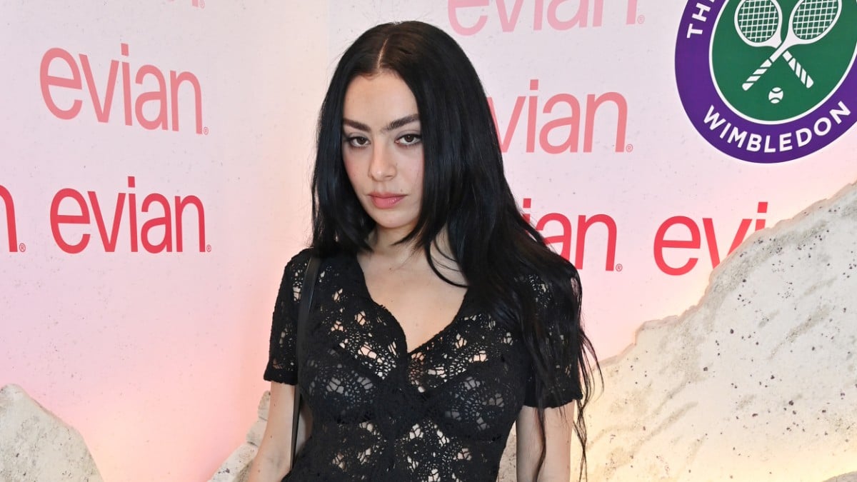 Charli XCX poses in the evian 'Mountain Of Youth' VIP suite during day 11 of Wimbledon 2024