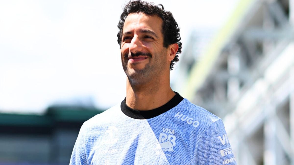 Daniel Ricciardo of Australia and Visa Cash App RB walks in the Paddock prior to the F1 Grand Prix of Singapore at Marina Bay Street Circuit on September 22, 2024 in Singapore, Singapore.