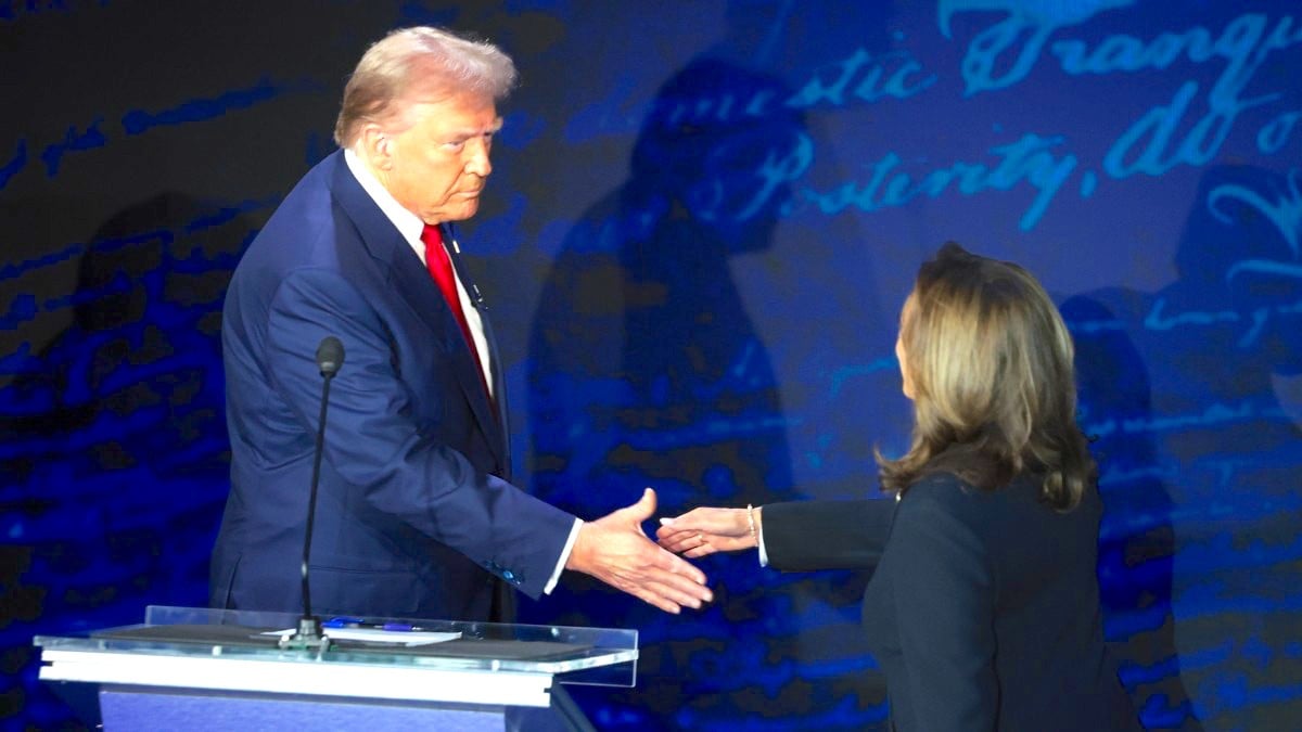 Donald Trump and Democratic presidential nominee, U.S. Vice President Kamala Harris greet as they debate for the first time during the presidential election campaign