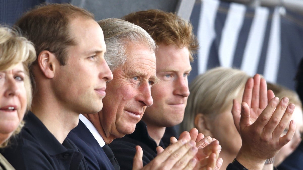 Prince William, Duke of Cambridge, Prince Charles, Prince of Wales & Prince Harry watch the athletics during the Invictus Games at the Lee Valley Athletics Centre on September 11, 2014 in London, England.