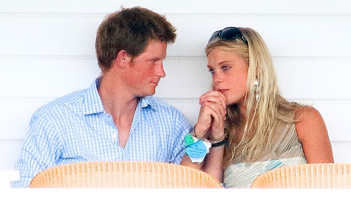 Prince Harry and Chelsy Davy sit in the Royal Box as they attend the Cartier International Polo Match at Guards Polo Club, Smith's Lawn on July 30, 2006 in Egham, England. 