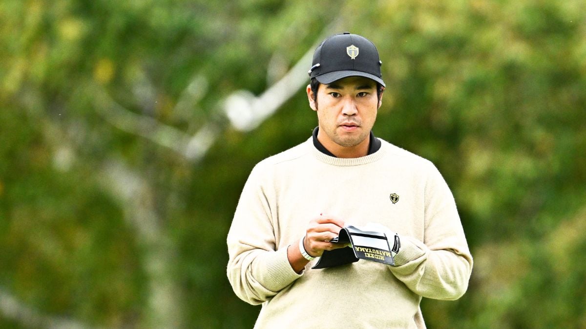 MONTREAL, QUEBEC - SEPTEMBER 24: Hideki Matsuyama of Japan and the International Team checks his yardage book prior to the 2024 Presidents Cup at The Royal Montreal Golf Club on September 24, 2024 in Montreal, Quebec, Canada. (Photo by Minas Panagiotakis/Getty Images)