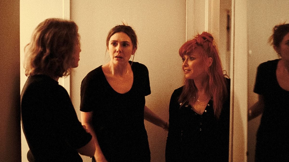 His Three Daughters. (L-R) Carrie Coon as Katie, Elizabeth Olsen as Christina and Natasha Lyonne as Rachel in His Three Daughters. Cr. Netflix ©2024.