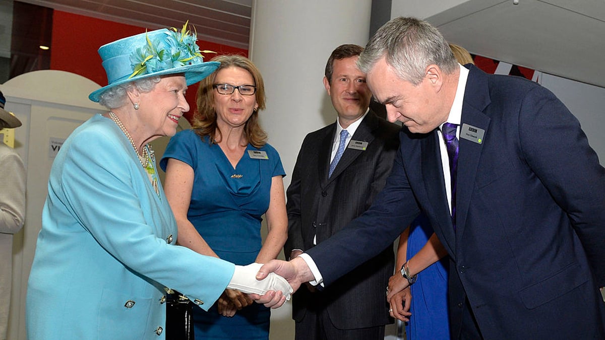 Queen Elizabeth II meets newsreader Huw Edwards as she opens the new BBC Broadcasting House on June 7, 2013 in London, England.