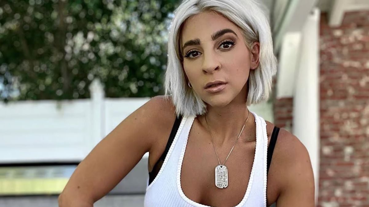 Gabbi Hanna with platinum blonde hair in official photography