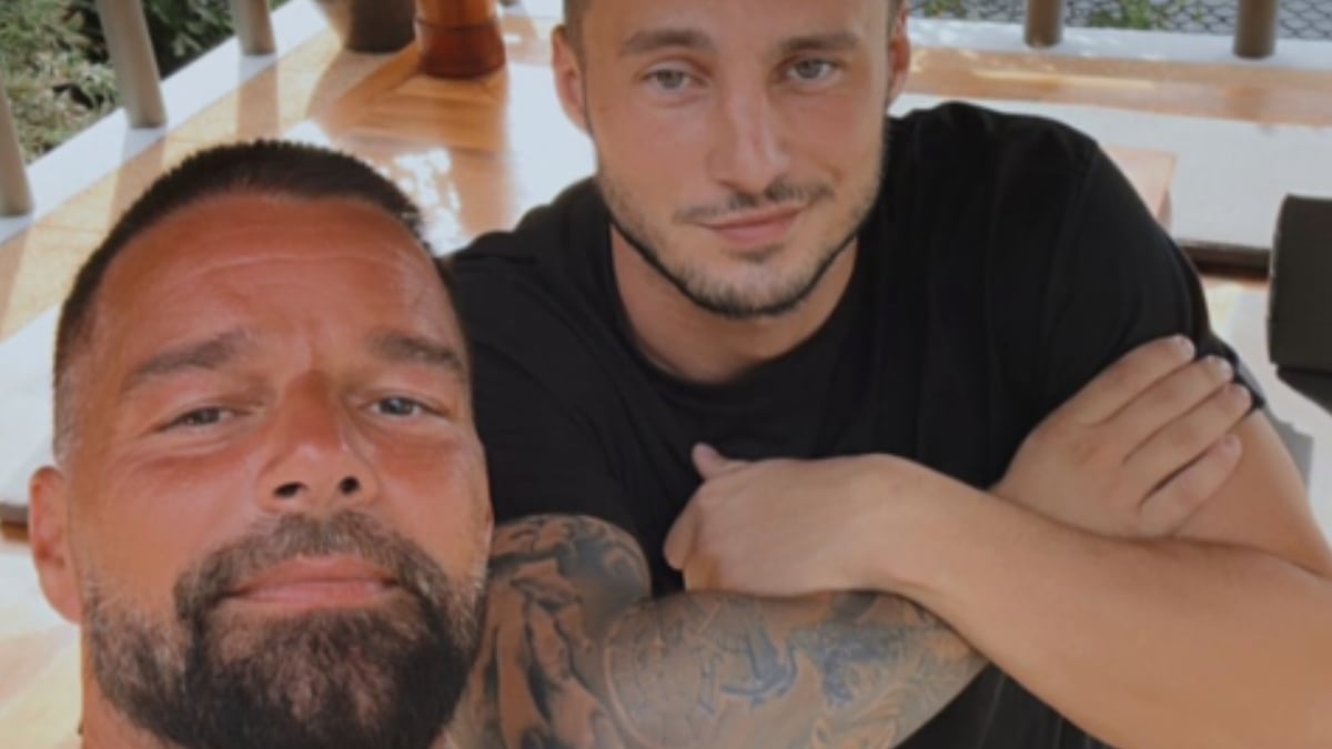 Ricky Martin and Max Barz pose for a photo