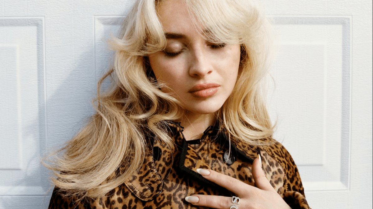 Sabrina Carpenter sporting a leopard coat on the cover of 'W Magazine.'