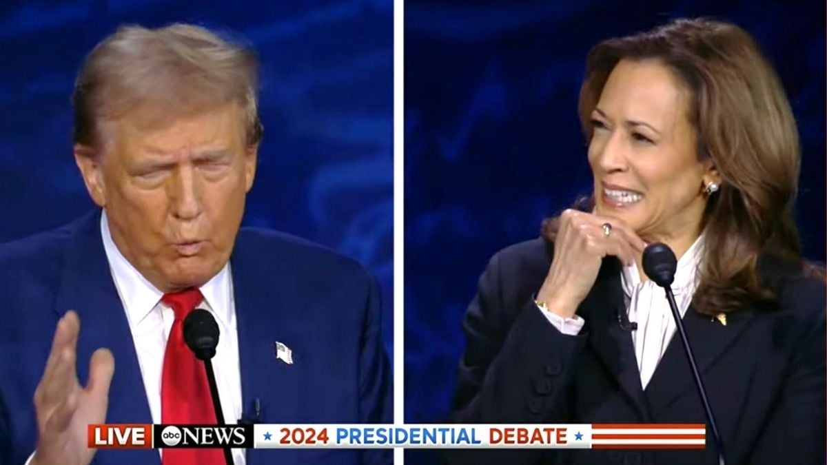 Screengrab from the Trump/Harris debate, with Trump looking flustered as Harris appears amused.