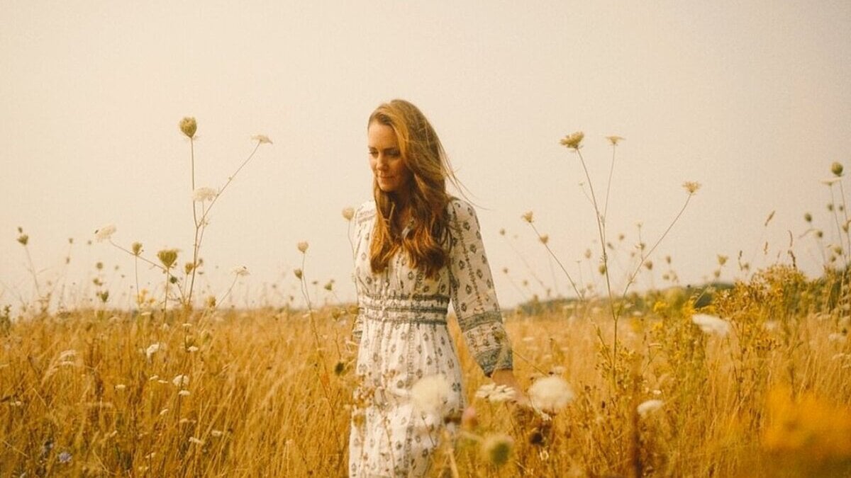 Princess Catherine walks through a field