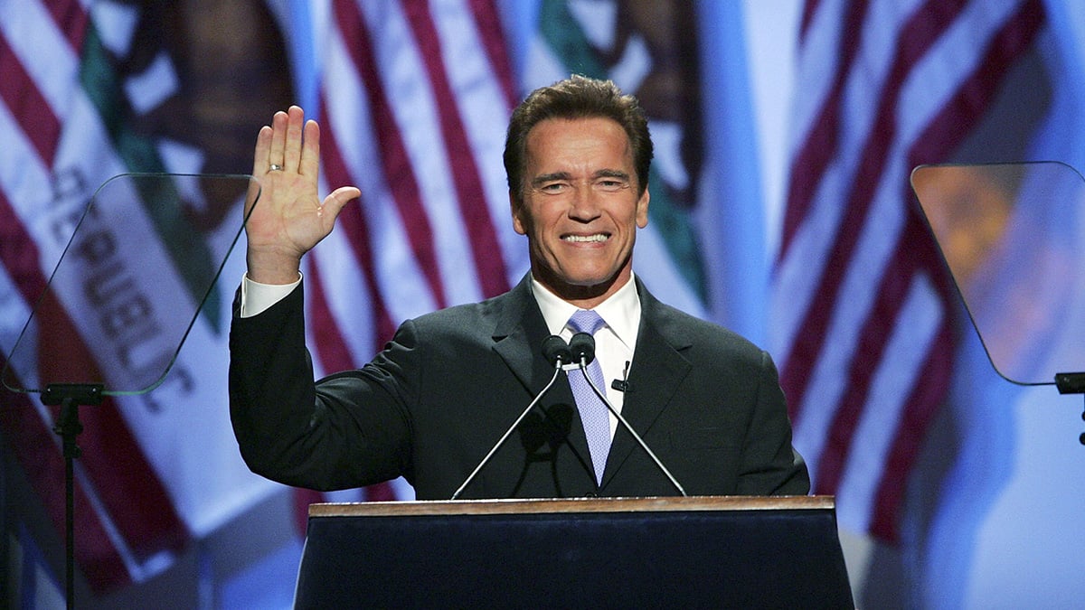 Then governor Arnold Schwarzenegger waves to a crowd of supporters in 2007