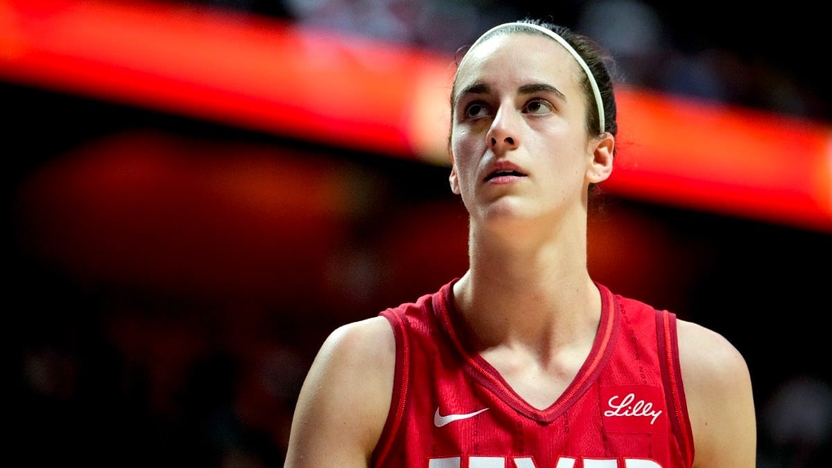 Caitlin Clark #22 of the Indiana Fever looks on as she plays the Connecticut Sun during the first quarter of Game Two of the 2024 WNBA Playoffs