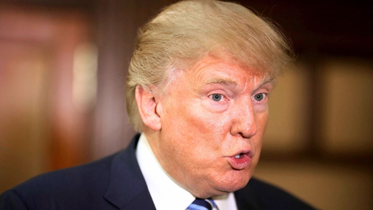 Republican presidential nominee Donald Trump is interviewed following the grand opening ceremony at the new Trump International Hotel October 26, 2016 in Washington, DC. The hotel, built inside the historic Old Post Office, has 263 luxury rooms, including the 6,300-square-foot 'Trump Townhouse' at $100,000 a night, with a five-night minimum. The Trump Organization was granted a 60-year lease to the historic building by the federal government before the billionaire New York real estate mogul announced his intent to run for president.