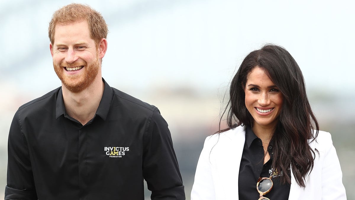 SYDNEY, AUSTRALIA - OCTOBER 20: Prince Harry, Duke of Sussex and Meghan, Duchess of Sussex smile during the JLR Drive Day at Cockatoo Island on October 20, 2018 in Sydney, Australia.