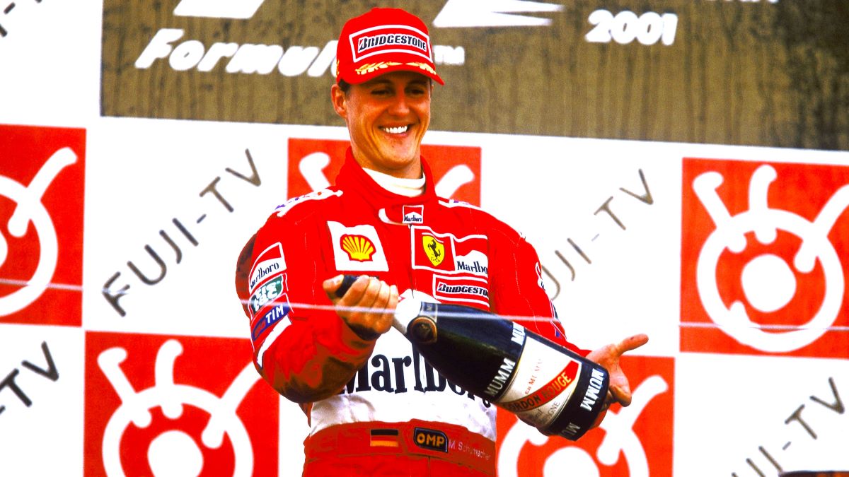 Ferrari driver Michael Schumacher of Germany celebrates on the Podium after winning the Formula One Japanese Grand Prix held at the Suzuka Circuit in Suzuka, Japan. \ Mandatory Credit: Mark Thompson /Allsport