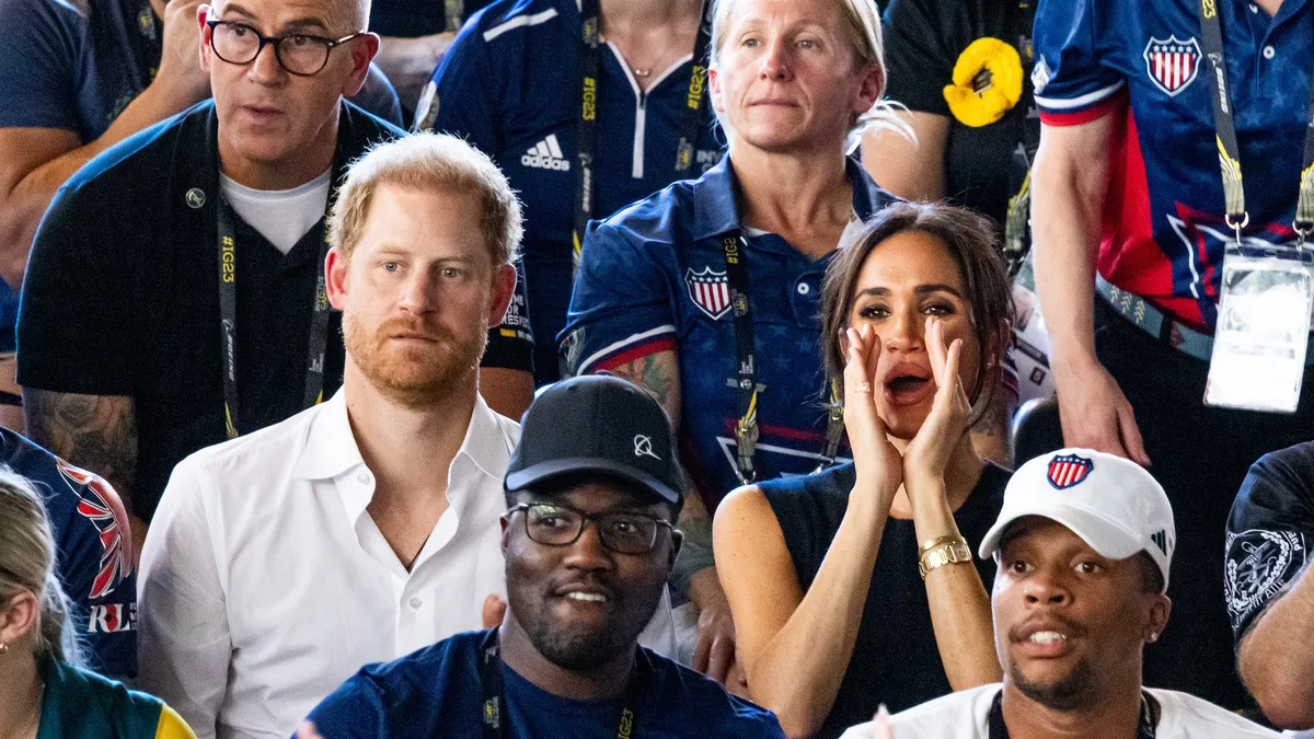 DUSSELDORF, GERMANY - SEPTEMBER 13: Prince Harry, Duke of Sussex and Meghan, Duchess of Sussex attend the swimming finals at Rheinland during day four of the Invictus Games on September 13, 2023 in Dusseldorf, Germany.