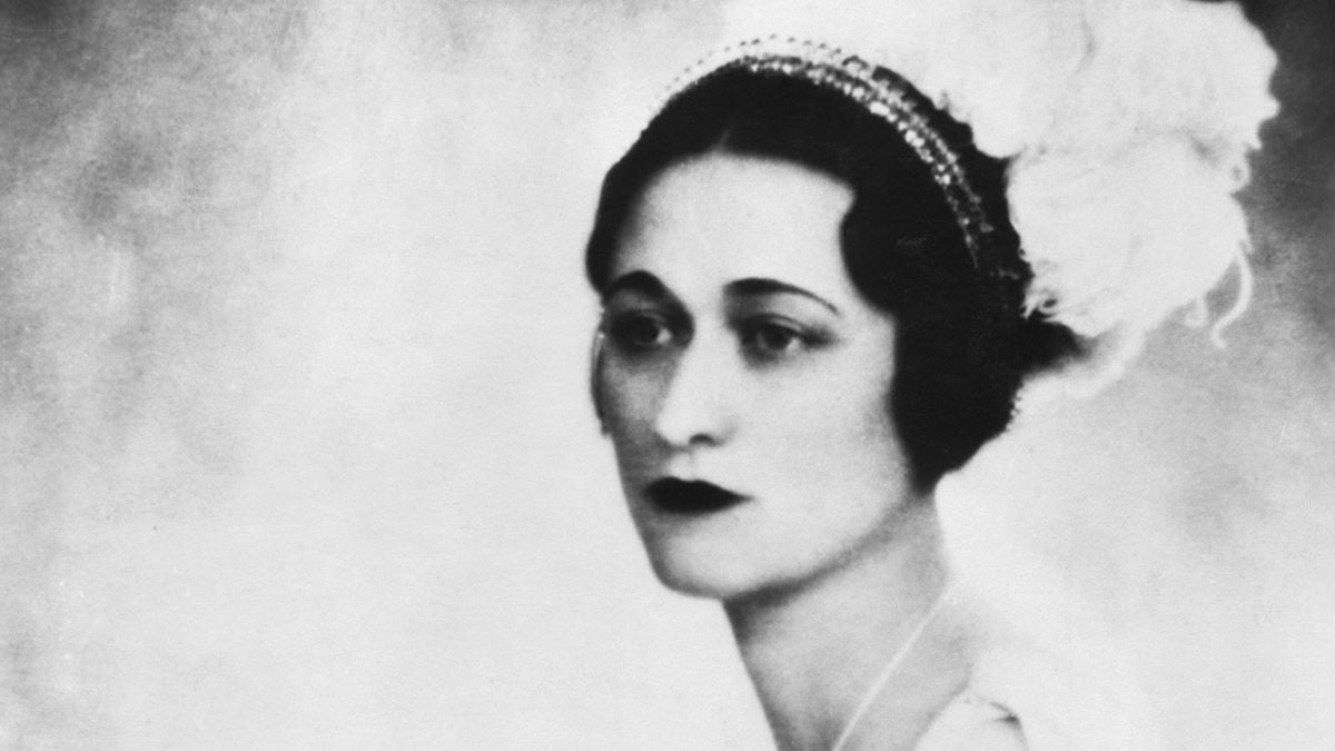 Portrait of Wallis Simpson taken in the gown she wore when presented at court in the 1920s. (Photo by © Hulton-Deutsch Collection/CORBIS/Corbis via Getty Images)