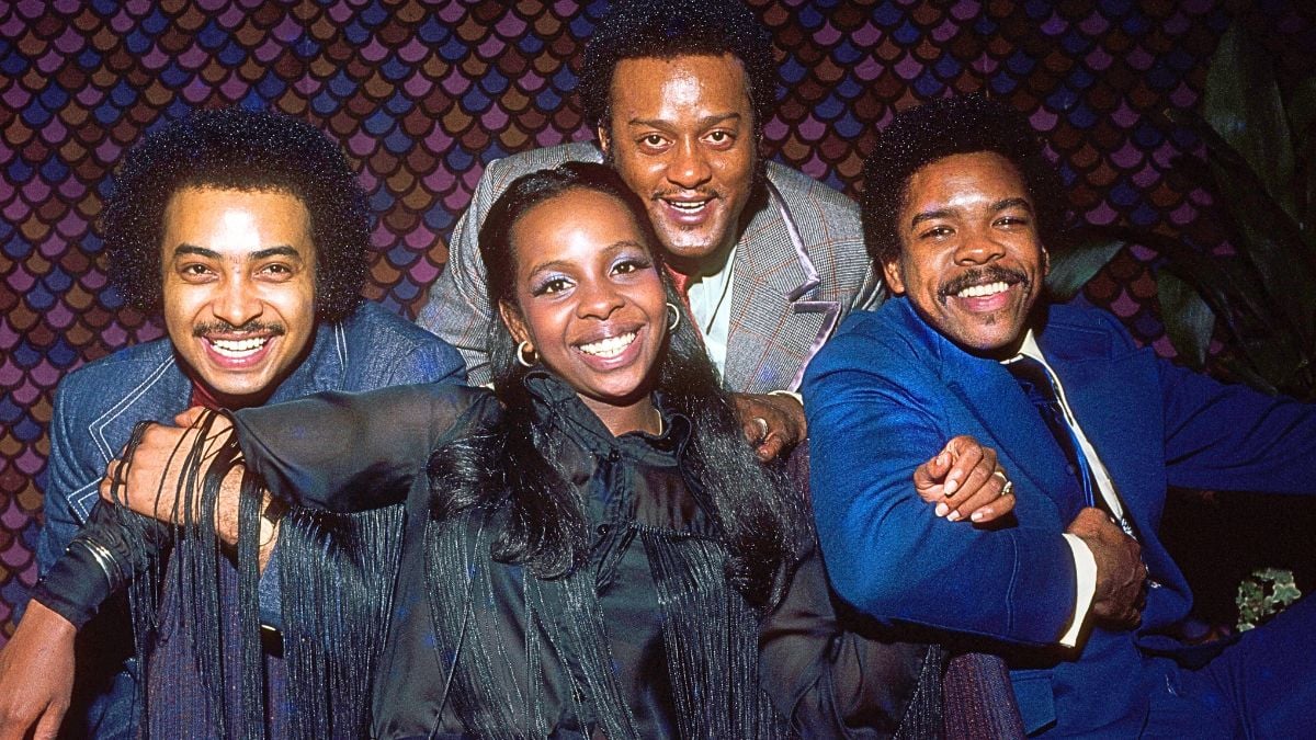 Portrait of American musucian Gladys Knight (center, fore) and members of her group, the Pips,, London, England, 1976.