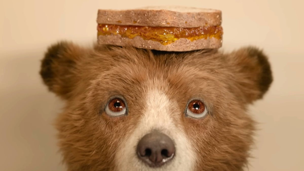 Paddington Bear with a marmalade sandwich on his head in Paddington in Peru