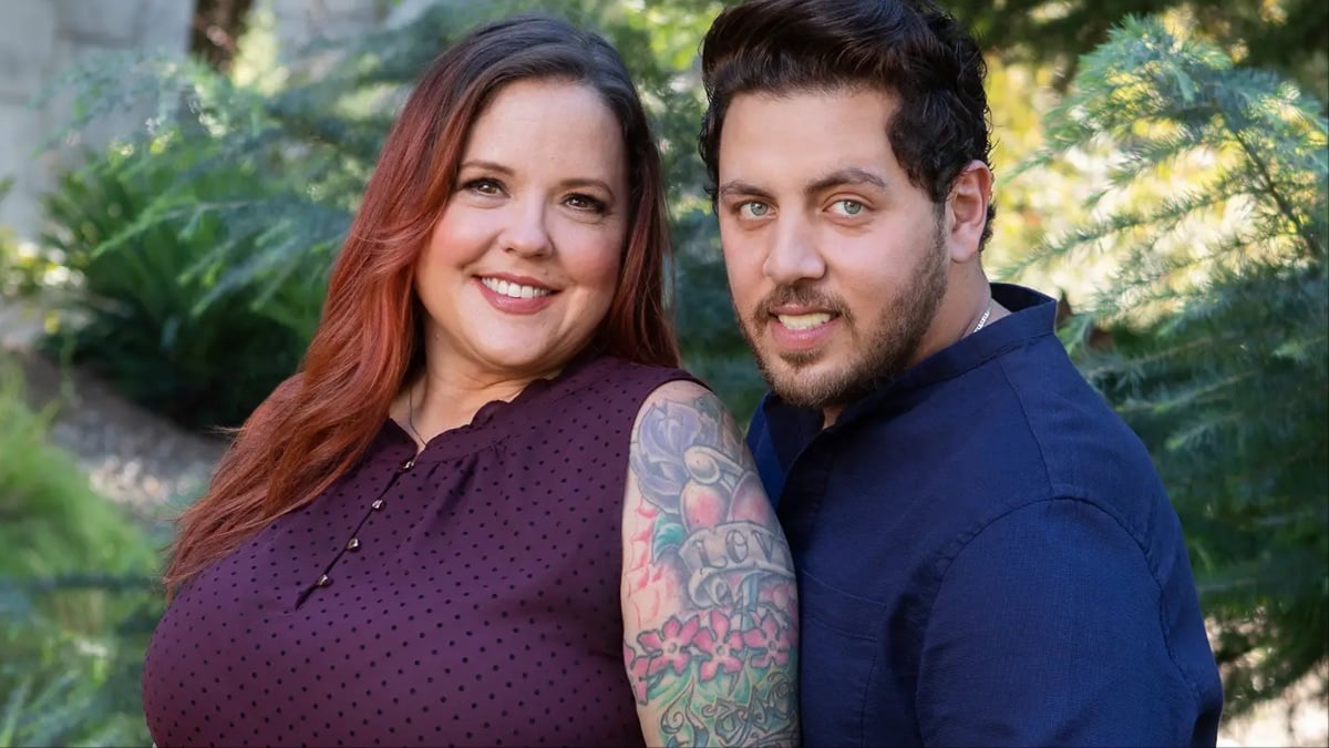 Rebecca and Zied pose in an embrace for '90 Day Fiancé'