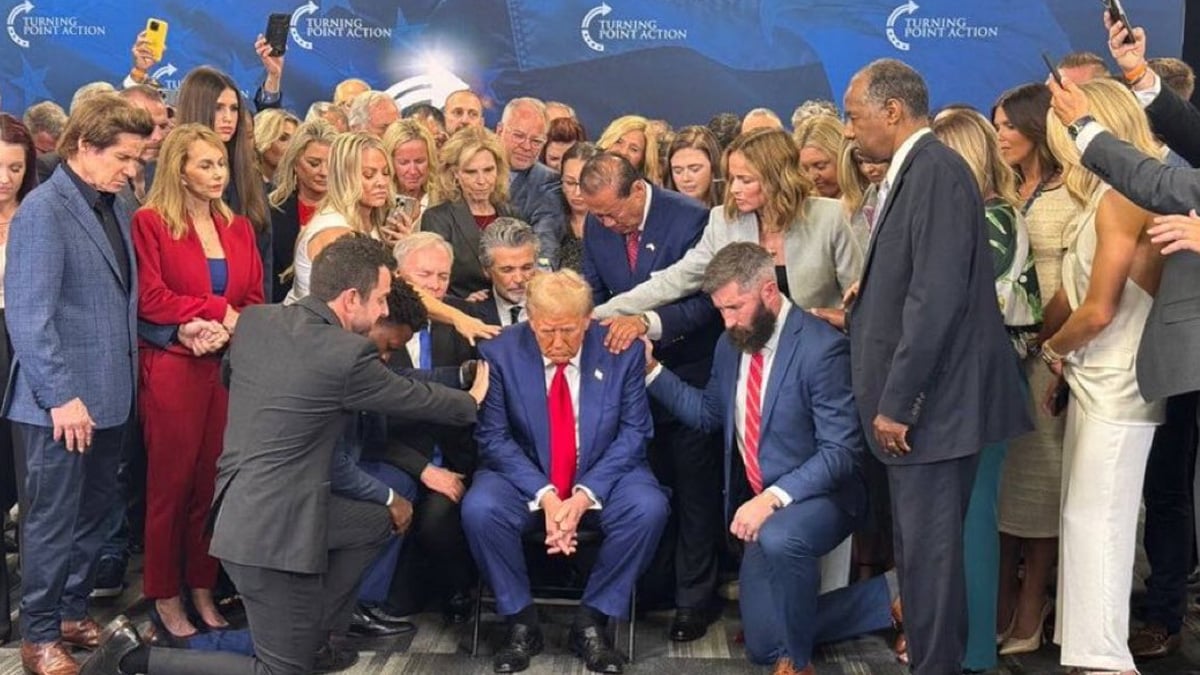 A group of weirdos pray over Donald Trump