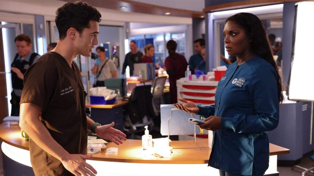 Darren Barnet as Dr. John Frost and Marlyne Barrett as Maggie Lockwood on Chicago Med