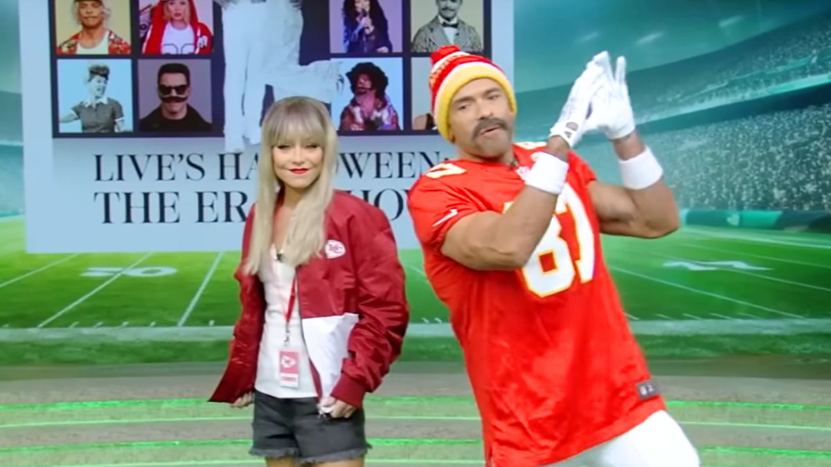 Kelly Ripa as Taylor Swift and Mark Consuelos as Travis Kelce during Halloween 2023