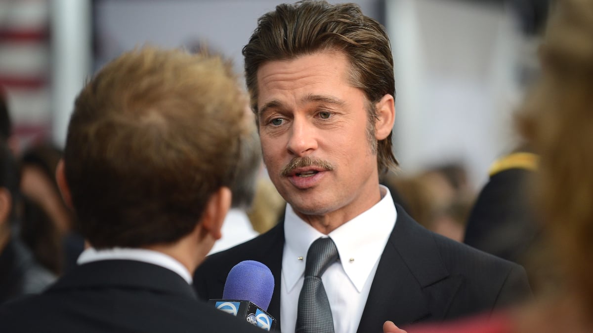 Actor Brad Pitt, the star of the movie, who plays the part of “Wardaddy/Don Collier”, gives interviews with the media on the “Red Carpet” during the world premiere of the movie Fury at the Newseum in Washington D.C.