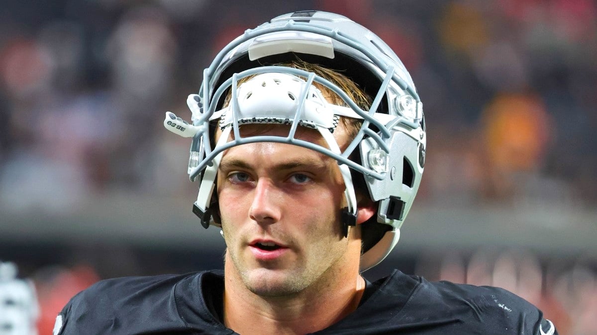 Brock Bowers #89 of the Las Vegas Raiders leaves the field after the team's 27-20 loss to the Kansas City Chiefs