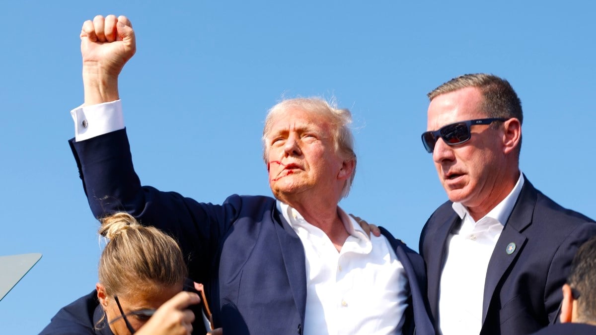 Donald Trump is rushed offstage during a rally on July 13, 2024 in Butler, Pennsylvania