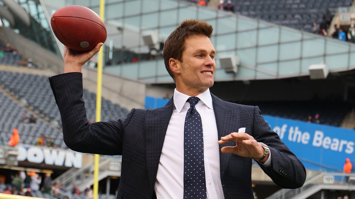 CHICAGO, ILLINOIS - NOVEMBER 17: Fox Sports commentator Tom Brady looks on prior to the game between the Chicago Bears and the Green Bay Packers at Soldier Field on November 17, 2024 in Chicago, Illinois.