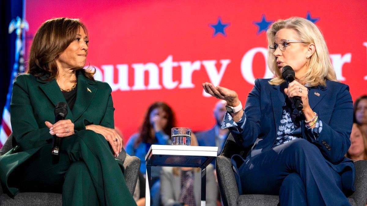 Kamala Harris, speaks with former U.S. Rep. Liz Cheney (R-WY) at a town hall at the Royal Oak Music Theatre