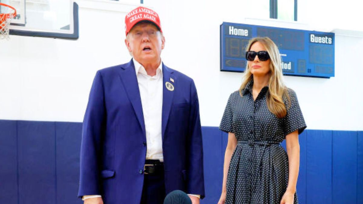 PALM BEACH, FLORIDA - NOVEMBER 05: Republican presidential nominee former President Donald Trump and his wife Melania Trump talk to reporters after casting their votes at the polling place in the Morton and Barbara Mandel Recreation Center on Election Day, on November 05, 2024 in Palm Beach, Florida. Trump will hold an Election Night event at the Palm Beach Convention Center. (Photo by Chip Somodevilla/Getty Images)