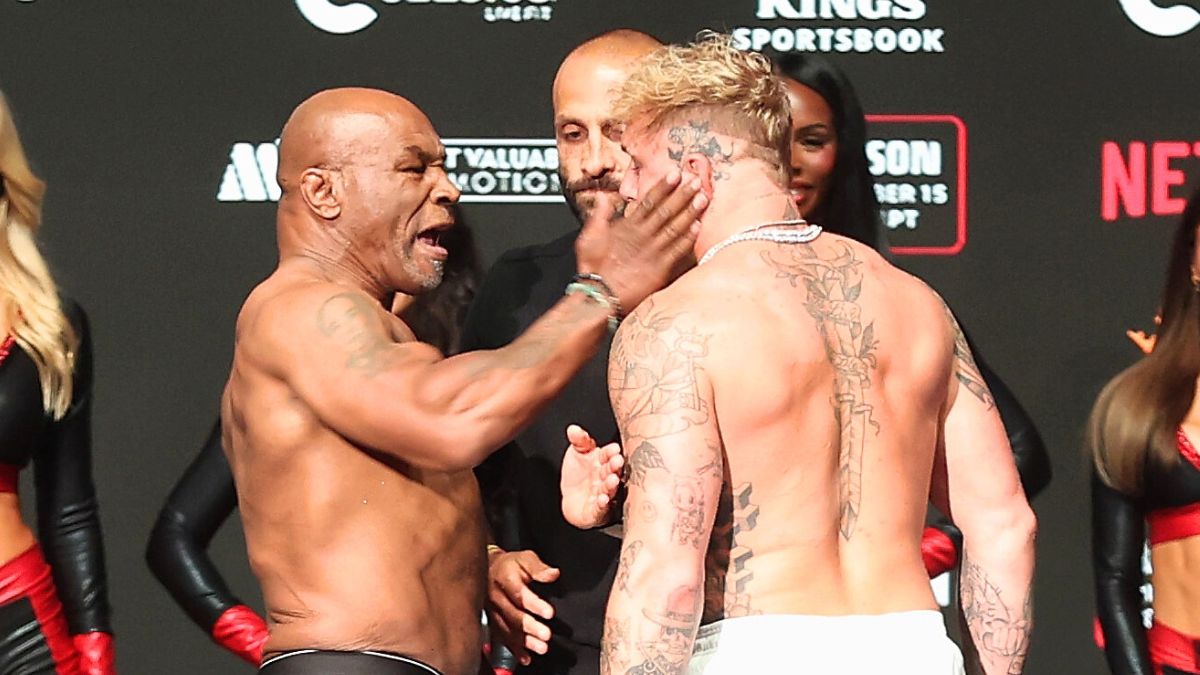 Mike Tyson (L) slaps Jake Paul as they face off during their ceremonial weigh-in at The Pavilion at Toyota Music Factory on November 14, 2024 in Irving, Texas. The two are scheduled to meet in a heavyweight bout on November 15 at AT&T Stadium in Arlington, Texas. (Photo by Christian Petersen/Getty Images)