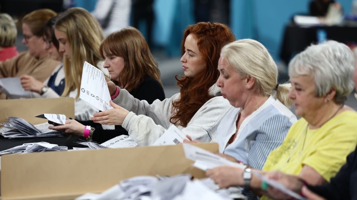 Workers counting ballots