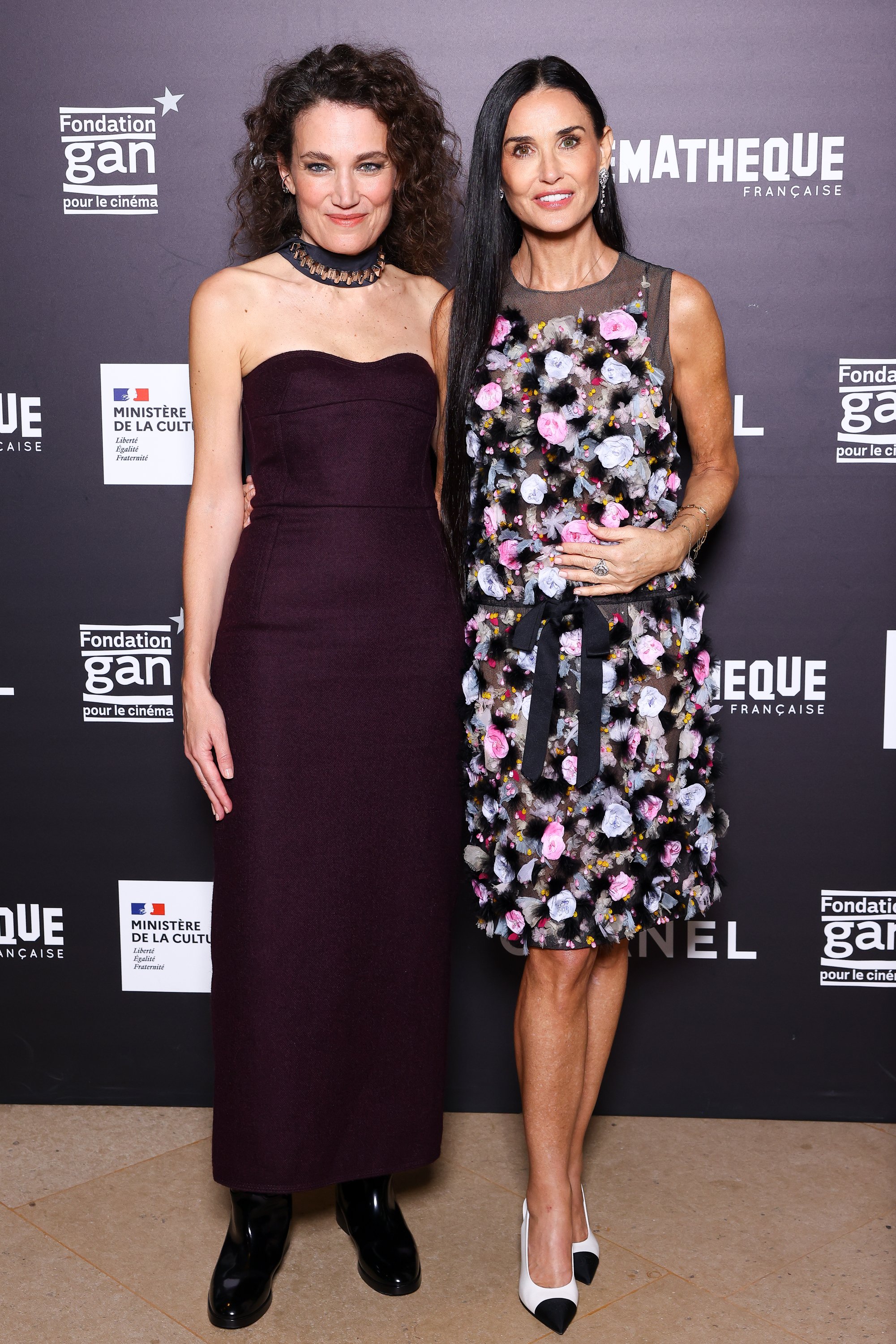 Director Coralie Fargeat and Demi Moore attend the "The Substance" Premiere at Cinematheque Francaise on November 05, 2024 in Paris, France. 