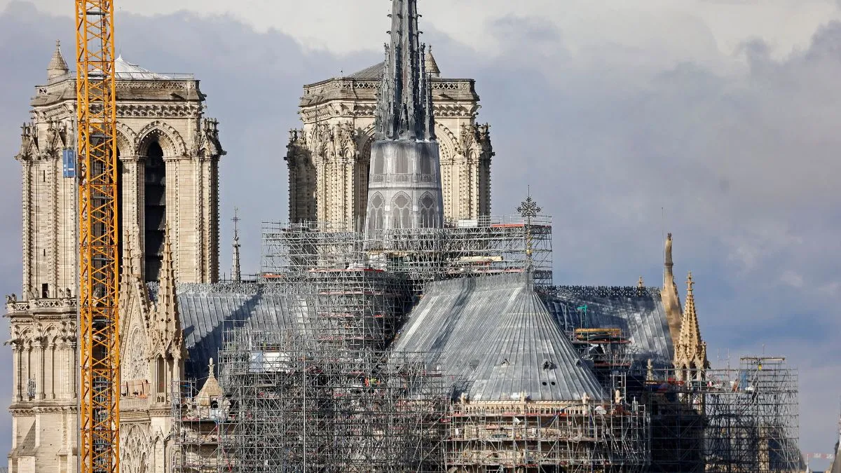 Notre Dame Cathedral surrounded by cranes is seen two weeks before its scheduled reopening to the public on December 7, 2024 on November 22, 2024 in Paris, France. On the evening of Monday, April 15, 2019, a fire broke out in Notre-Dame Cathedral and quickly spread to the wooden roof, causing extensive damage to the building and destroying its famous spire.