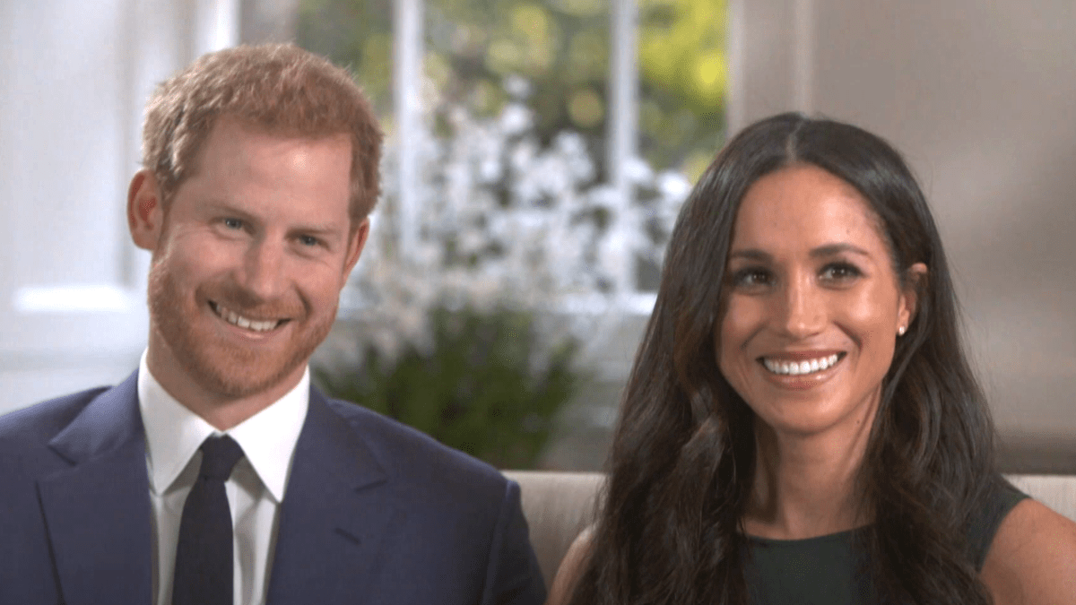 Prince Harry and Meghan Markle smile in their first interview post-engagement in 2018