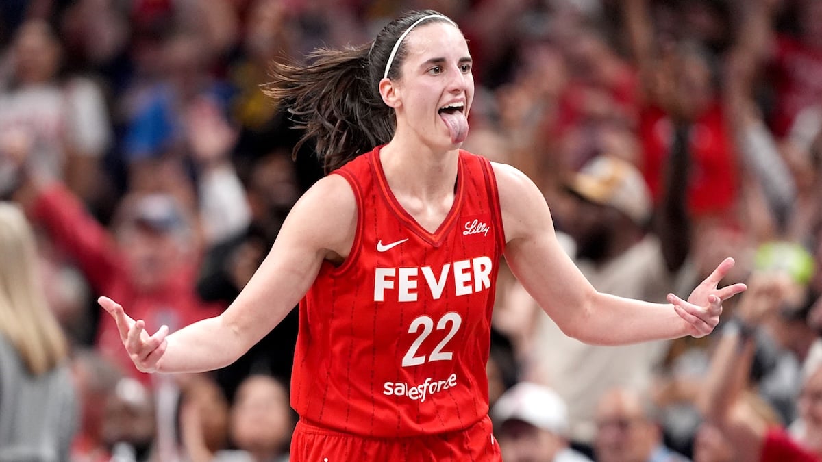 Caitlin Clark #22 of the Indiana Fever celebrates a basket during the second half of a game against the Las Vegas Aces at Gainbridge Fieldhouse