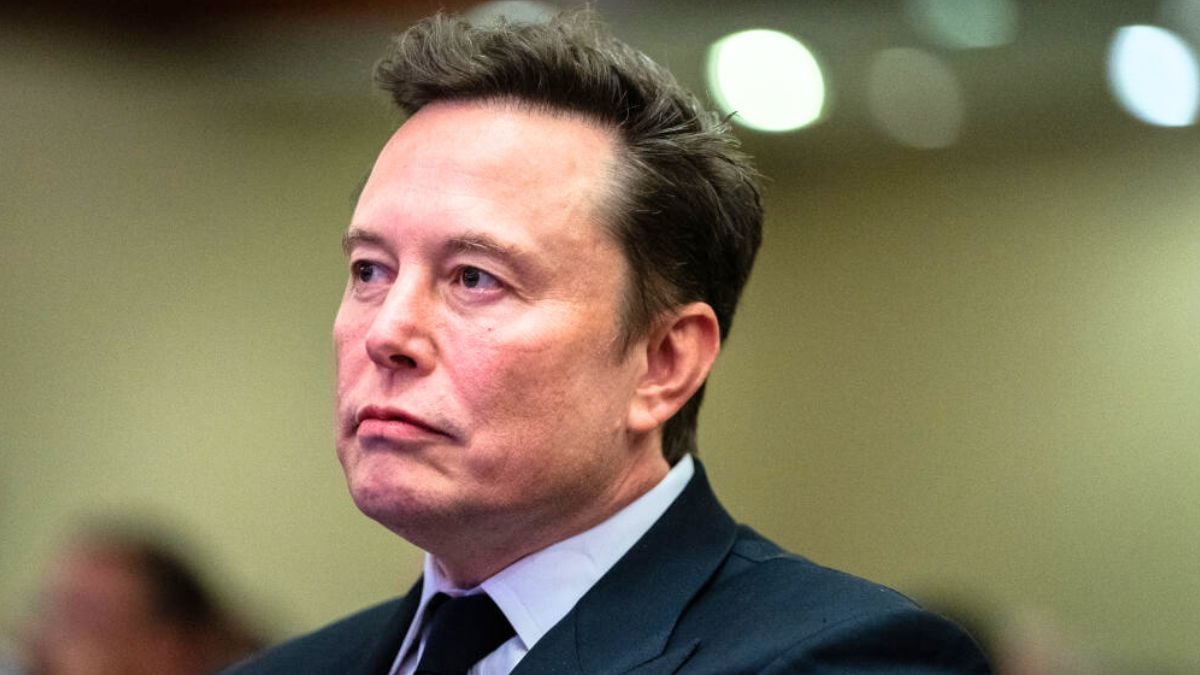 WASHINGTON, DC - NOVEMBER 13: Elon Musk listens as US President-elect Donald Trump speaks during a House Republicans Conference meeting at the Hyatt Regency on Capitol Hill on November 13, 2024 in Washington, DC. As is tradition with incoming presidents, President-elect Trump is traveling to Washington, DC to meet with U.S. President Joe Biden at the White House as well as Republican members of Congress on Capitol Hill. (Photo by Allison Robbert-Pool/Getty Images)