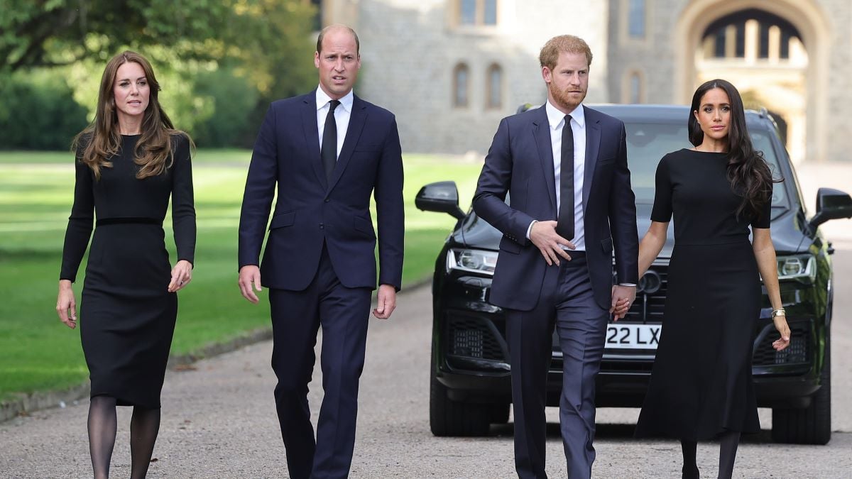 Catherine, Princess of Wales, Prince William, Prince of Wales, Prince Harry, Duke of Sussex, and Meghan, Duchess of Sussex on the long Walk at Windsor Castle arrive to view flowers and tributes to HM Queen Elizabeth on September 10, 2022 in Windsor, England. Crowds have gathered and tributes left at the gates of Windsor Castle to Queen Elizabeth II, who died at Balmoral Castle on 8 September, 2022. (Photo by Chris Jackson/Getty Images)