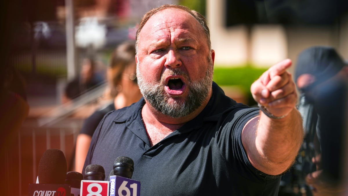 WATERBURY, CONNECTICUT - SEPTEMBER 21: InfoWars founder Alex Jones speaks to the media outside Waterbury Superior Court during his trial on September 21, 2022 in Waterbury, Connecticut. Jones is being sued by several victims' families for causing emotional and psychological harm after they lost their children in the Sandy Hook massacre. A Texas jury last month ordered Jones to pay $49.3 million to the parents of 6-year-old Jesse Lewis, one of 26 students and teachers killed in the shooting in Newtown, Connecticut.