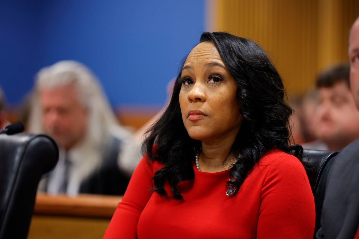 ATLANTA, GA - MARCH 01: Fulton County District Attorney Fani Willis looks on during a hearing in the case of the State of Georgia v. Donald John Trump at the Fulton County Courthouse on March 1, 2024, in Atlanta, Georgia. The hearing is to determine whether Fulton County District Attorney Fani Willis should be removed from the case because of a relationship with Nathan Wade, special prosecutor she hired in the election interference case against former President Donald Trump.