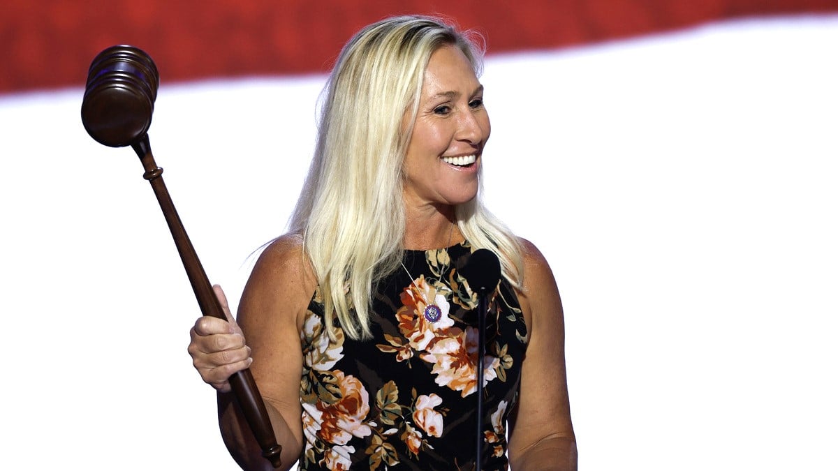 Rep. Marjorie Taylor Greene (R-GA) practices using the gavel onstage ahead of the start of the first day of the Republican National Convention at the Fiserv Forum on July 15, 2024 in Milwaukee, Wisconsin.